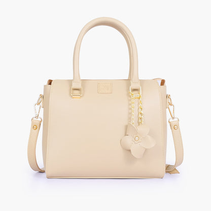 Off-white handbag with flower charm