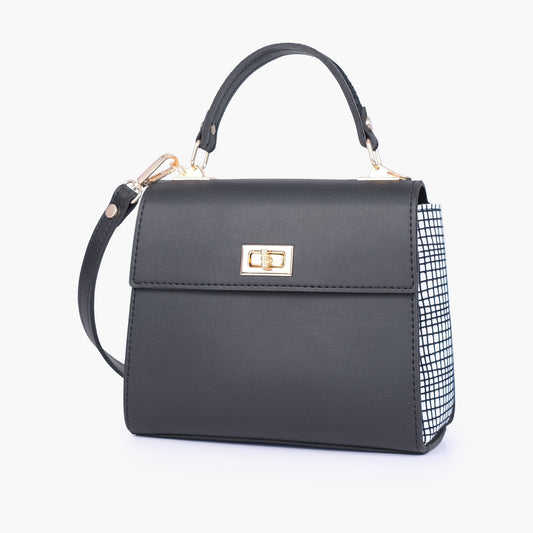 Black and white criss-cross top-handle bag